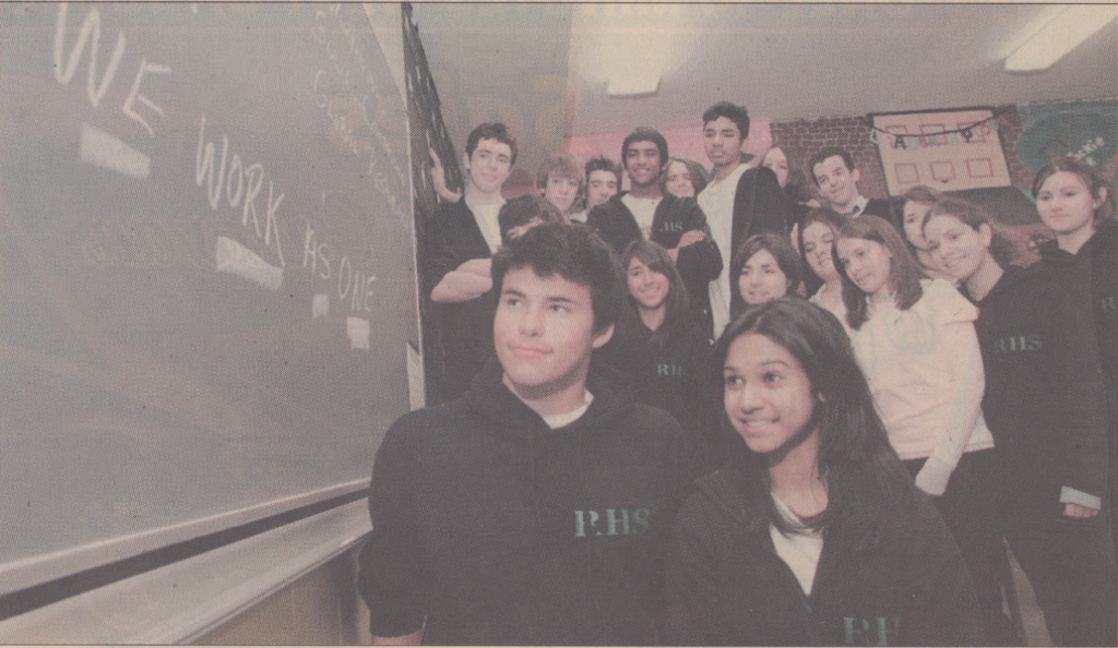 RICHARD ARLESS JR. THE GAZETTE L.  J. Aguinaga (left) and Hansi Peiris, with the rest of the leadership class at Riverdale High School, find themselves at loggerheads with the school board over the loss of their teacher and a lack of aid for their fundraising project.